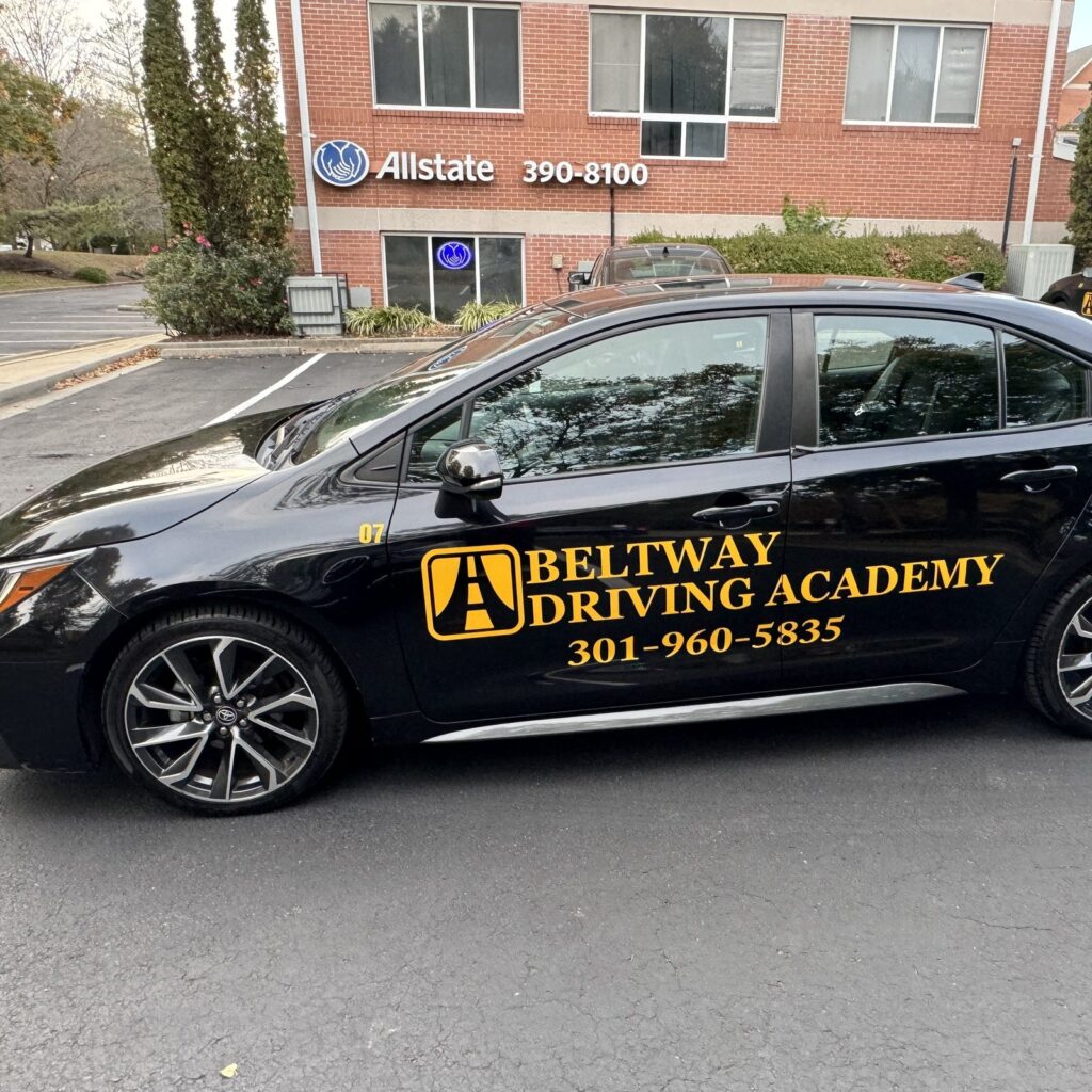 Black Beltway Driving Academy student driver car parked outside the Bowie office